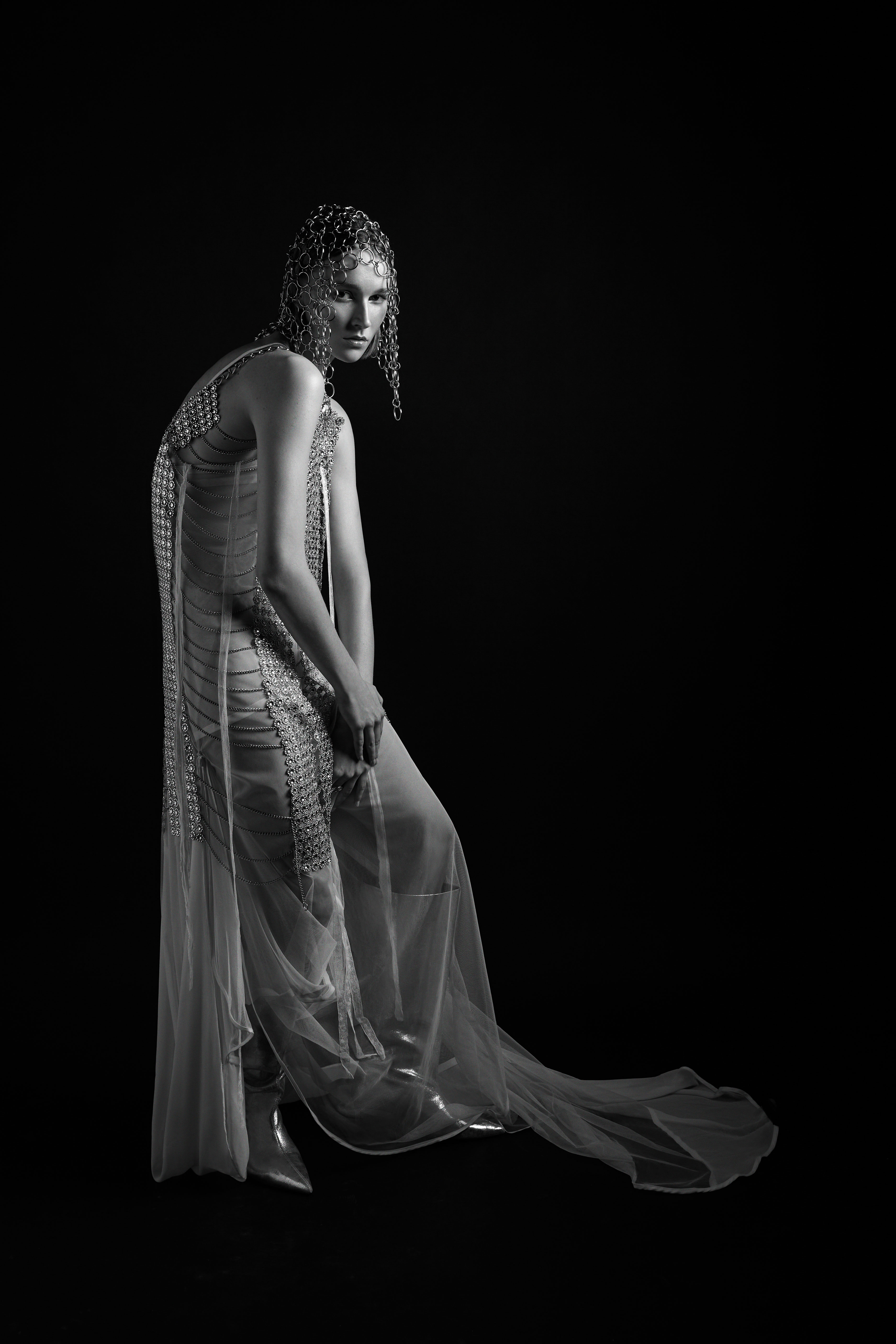 Editorial fashion image continuing the sculptural narrative
