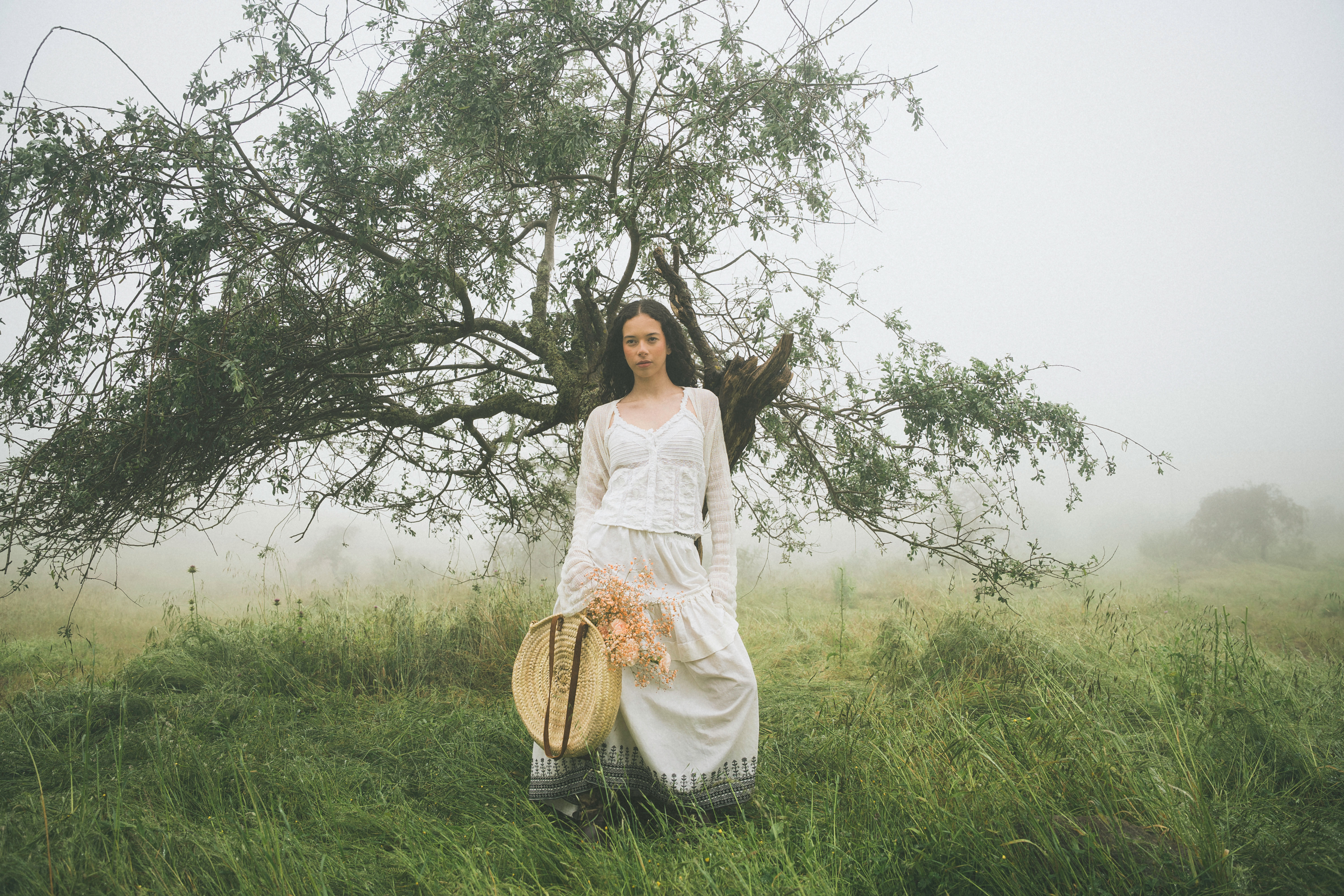 Editorial fashion portrait with sculptural styling and minimal composition