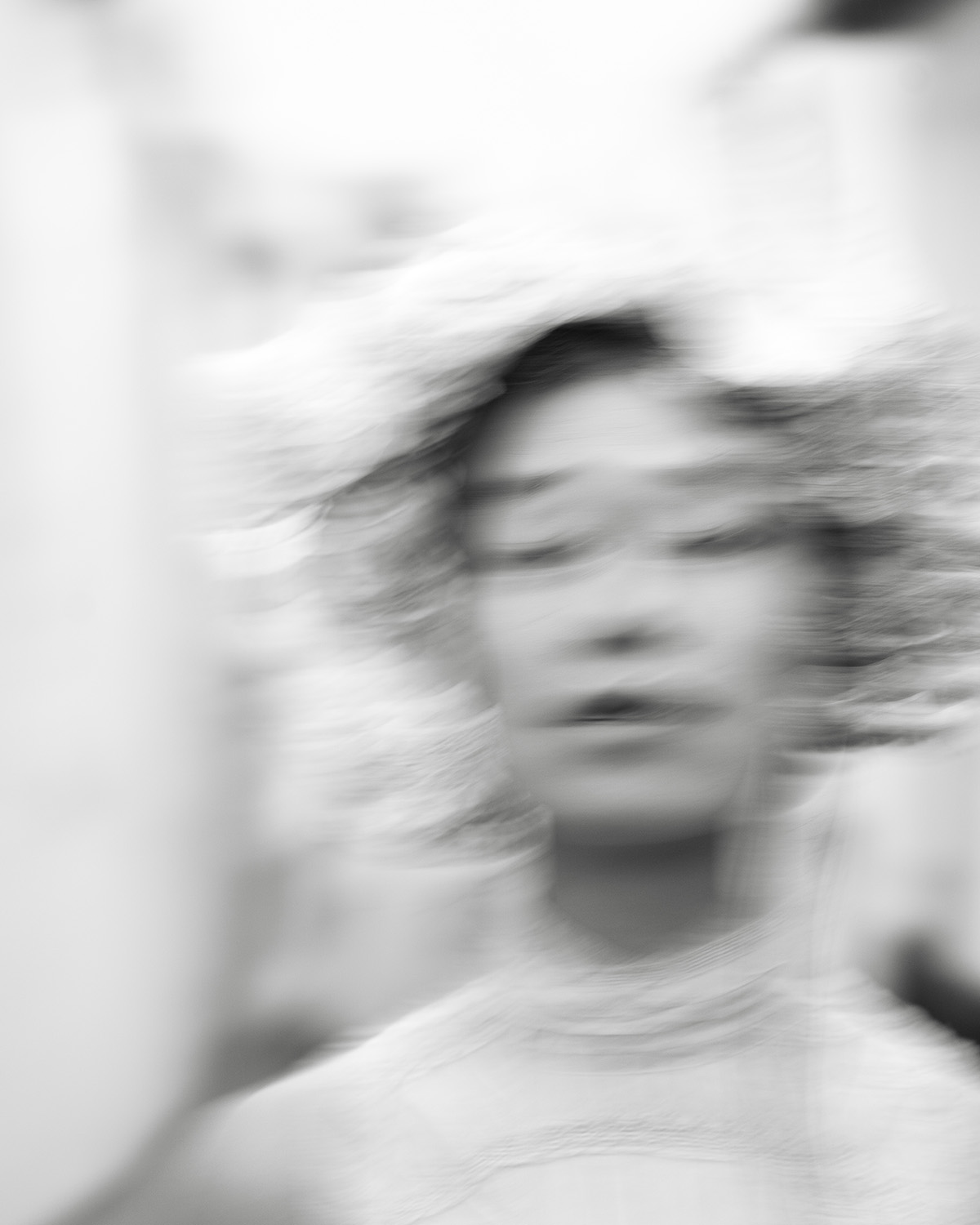 Editorial portrait of a model in Ethereal Blooms with soft floral styling and natural light.